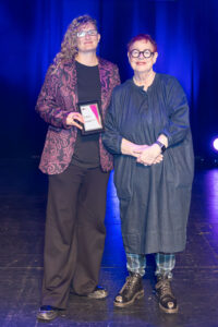 Winner on stage for the Elysian Awards 2026